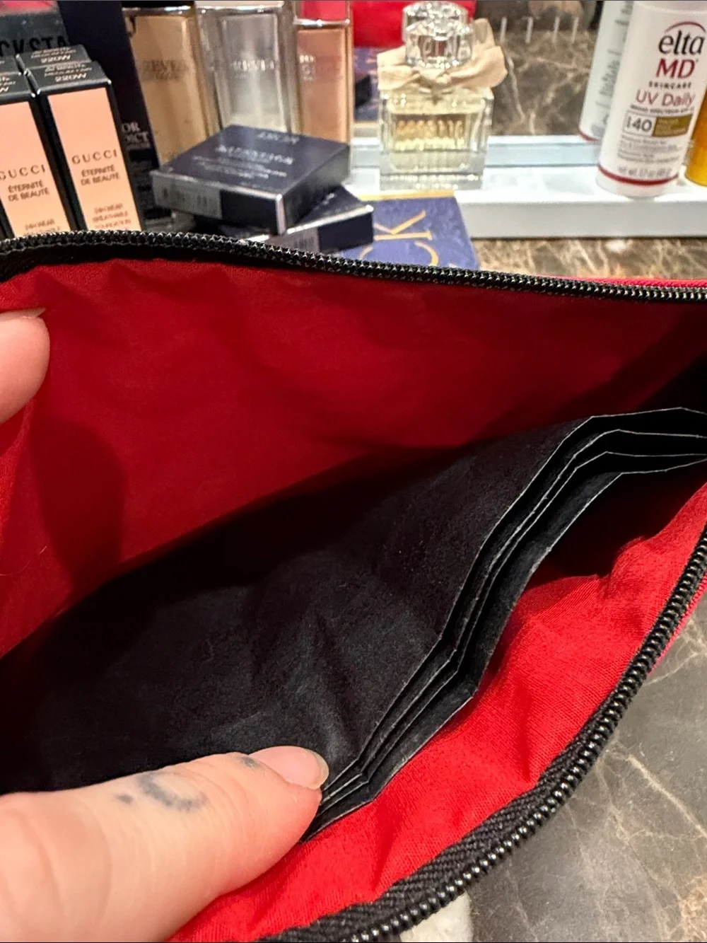 CHANEL Red Logo Zip Pouch